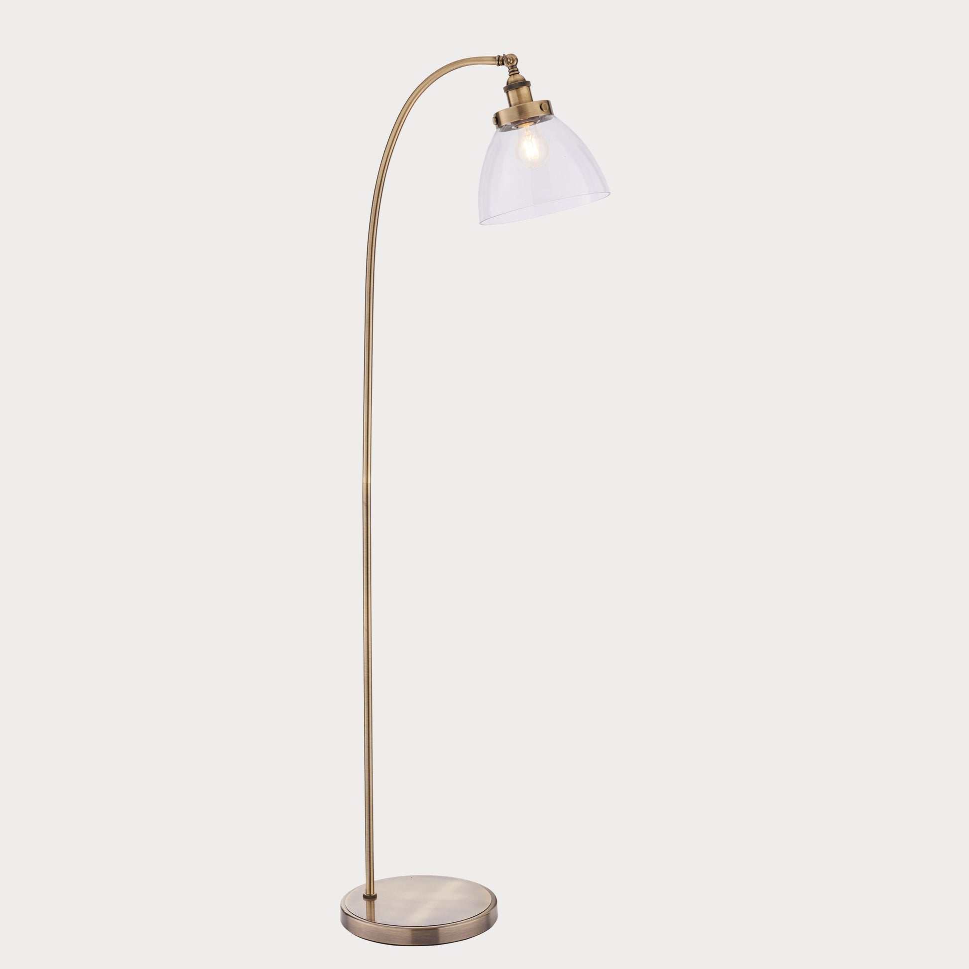 side profile of the tall brass lamp showcasing its sleek design