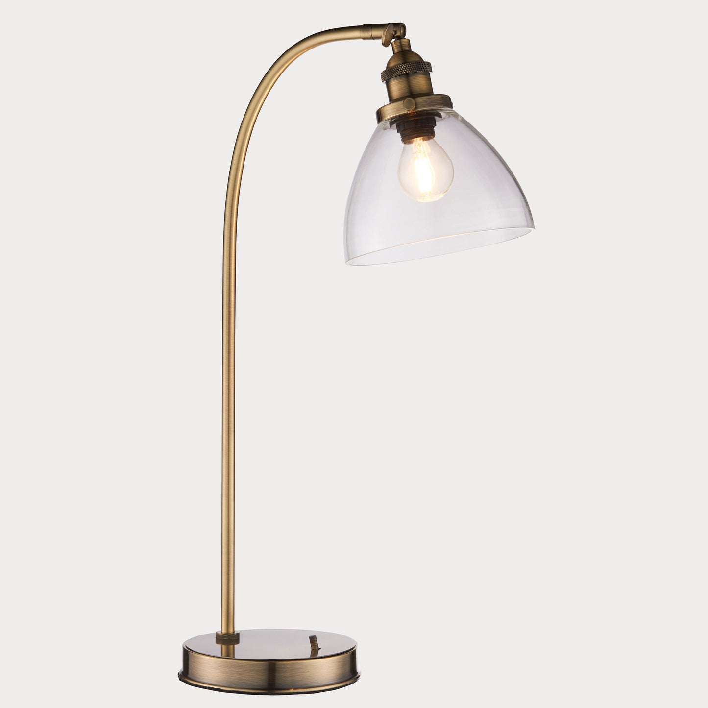 Close-up of the Antique Brass Floor Lamp highlighting its sleek design and brass finish.