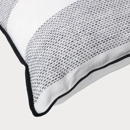 close of of the corner of the linen cushion showcasing its high quality craftsmanship