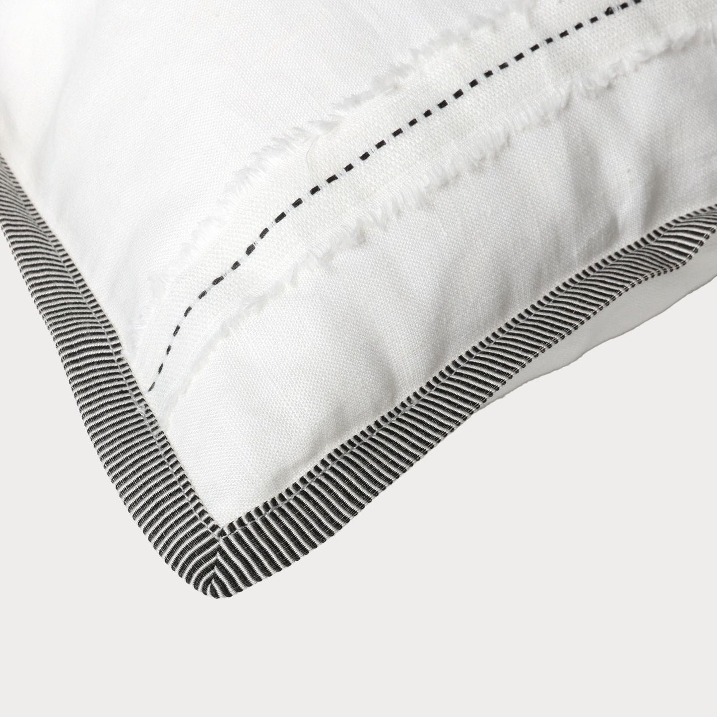 close up of the corner detailing of the cushion showcasing its design