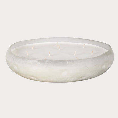 Close-up of Sea Salt Scented Candle's smooth wax surface in a stylish glass container.