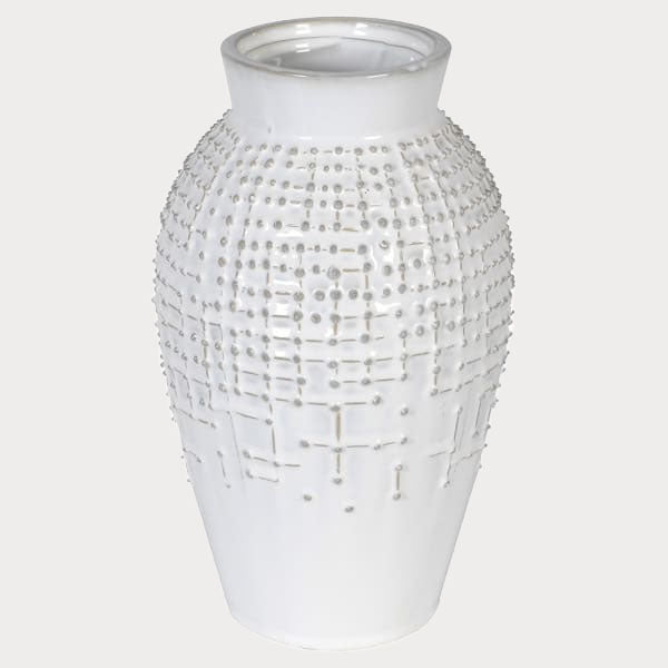Close-up of the Textured Dotty Vase showcasing its tactile dot pattern and neutral finish.
