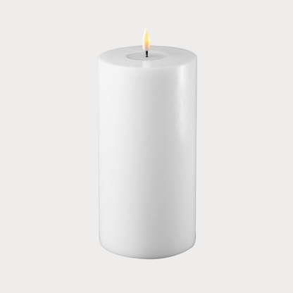 Wide White Indoor LED Candle illuminating a modern living room setting