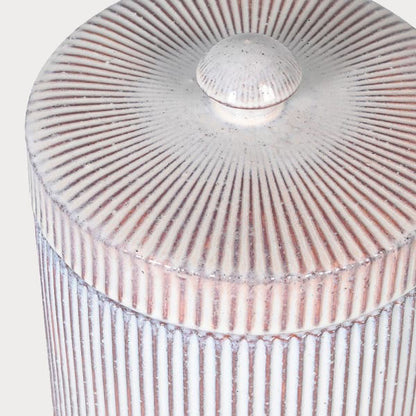 Side profile of Striped Lidded Jar highlighting its sleek cylindrical shape.