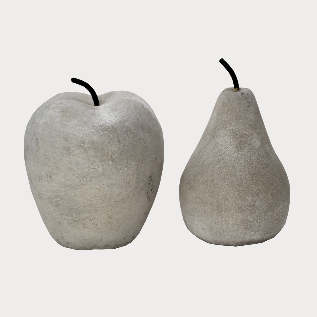 Close-up of Cement Apple Ornament showcasing its smooth finish and modern design.