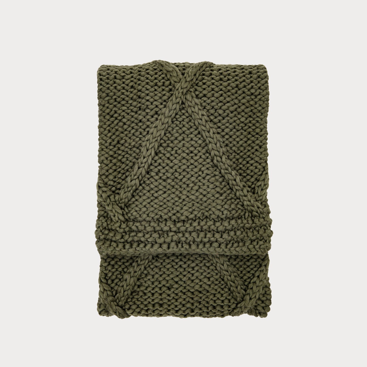 Close-up of the Knitted Diamond Throw showcasing its classic diamond pattern.