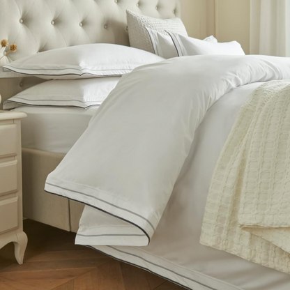 Close-up of the tri-color design on the Luxury Cotton Percale Bedding Set.