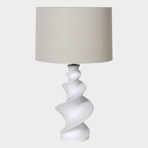 Close-up of the Swirl Table Lamp's ceramic base showcasing the delicate swirl design.